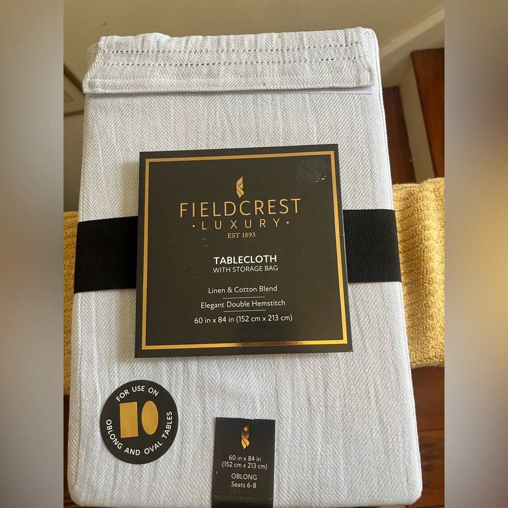 FieldCrest Luxury, table cloth with storage bag.